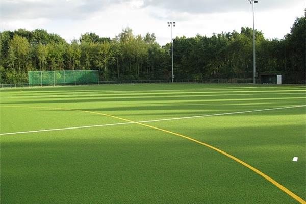 Renovatie kunstgras hockeyveld - Sportinfrabouw NV